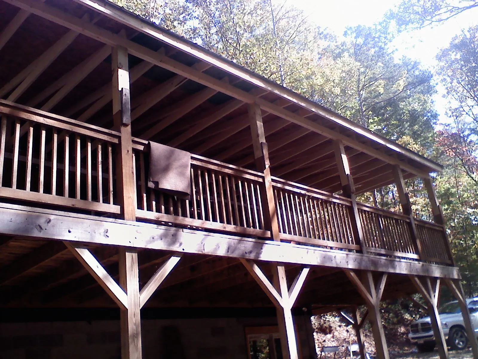 Timber framing under a new elevated porch and deck — Roof Leak Repair in Suttons Bay by Roofing Brothers